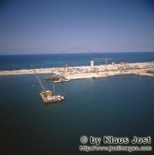 Ras el Tin Harbor Alexandria/Egypt        Crane barge with the block yard in background        