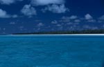 Blue lagoon with Midway Island